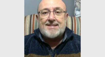 bold man with striped jersey