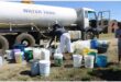 people get water from a tanker