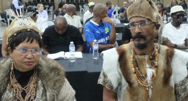 san people in traditional clothes