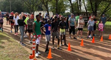 people gather at the start of a race