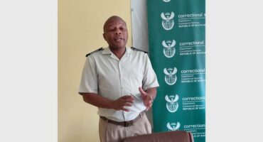 man in prison warden uniform