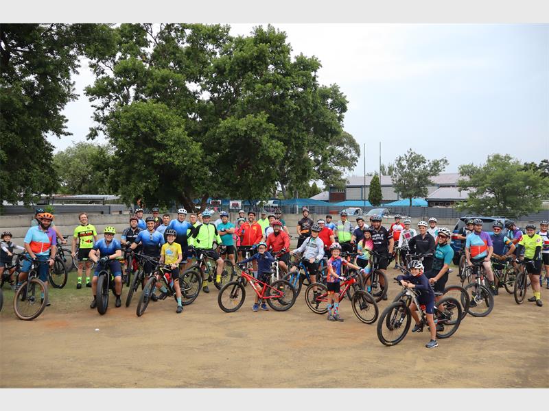 a large group of cyclists