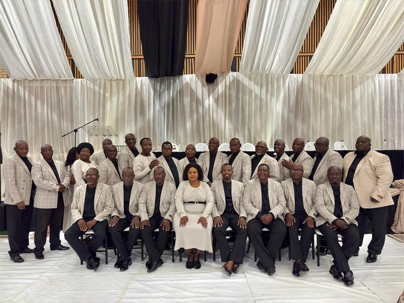 a formal photo of a large group of people