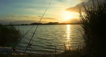 angling at dam at dawn