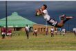rugbyplayer flies through the air