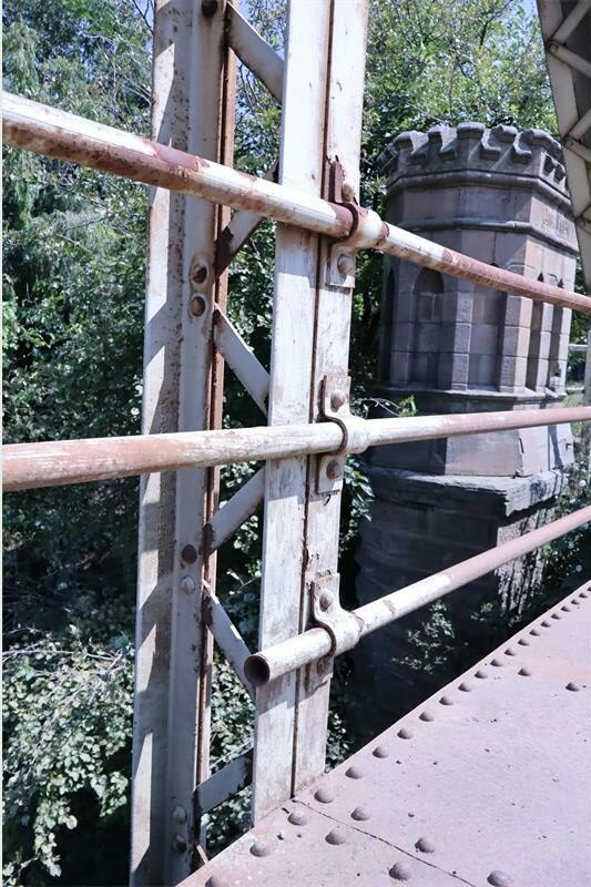 a piece of railing was removed from this bridge