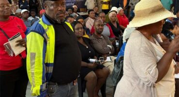 people standing around in a hall