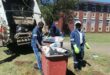 municipal workers removing refuse