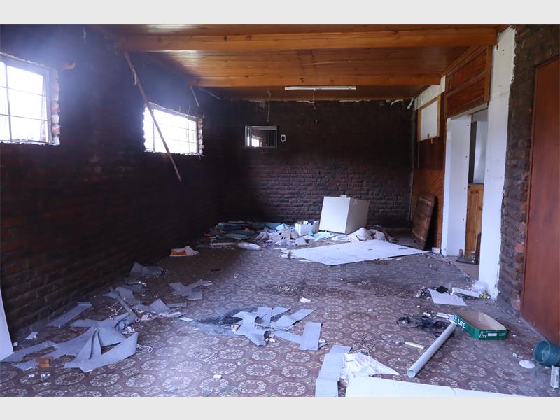 debris scattered throughout a building