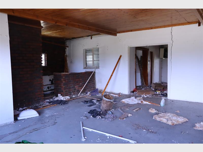 debris scattered throughout a building
