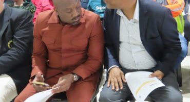 two men huddled together