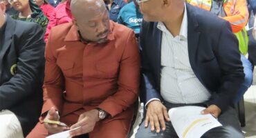 two men huddled together