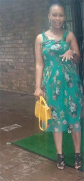 a woman in a green dress