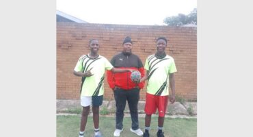 three men in sport gear