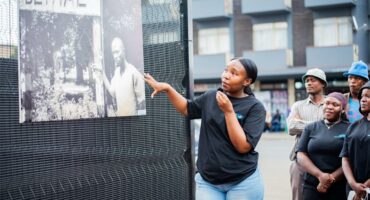 a woman talks about a picture
