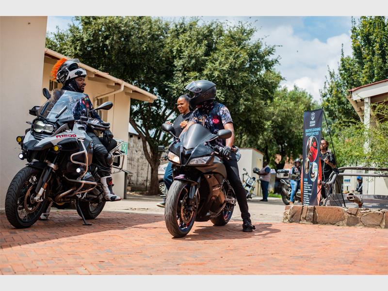 bikers arrive at a venue