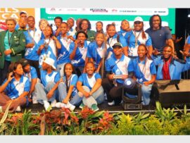 a large group poses for a pohto