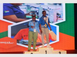 two people on a rostrum