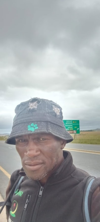 a selfie of a man along the road