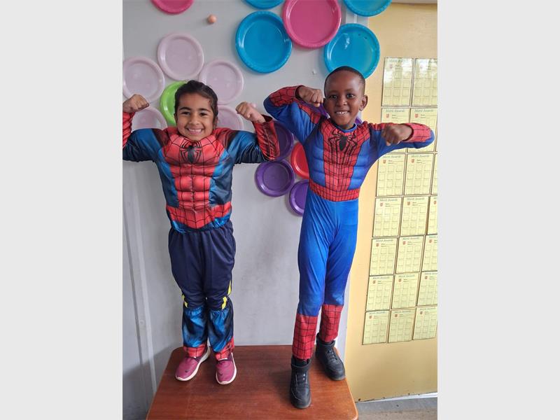 two boys dressed up as spiderman