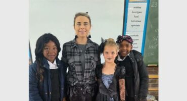 Roshni Mathebula (Grade Three), teacher Charlene Bouwer, Hope Bezuidenhout (Grade Three) and Dimpho Nxumalo (Grade Three) dressed in character.