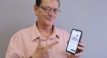 A man holding a cellphone