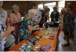 senior citizens browse through things to buy