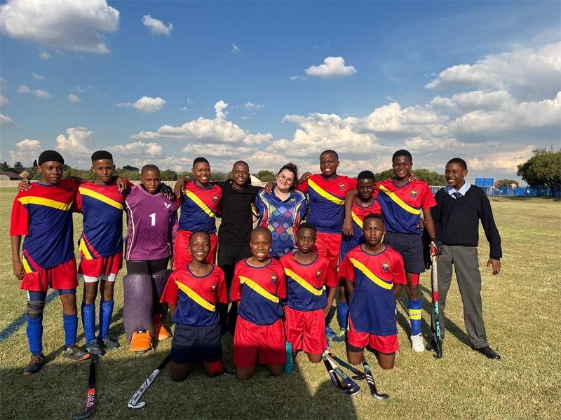 a sport team wearing red and blue kits