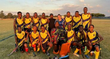 A sports team wearing yellow and black kits