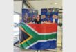 a girl with the south african flag