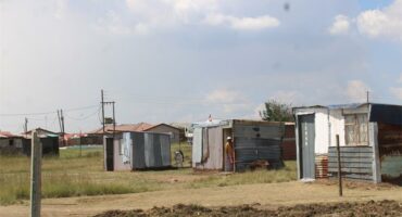 Shacks erected on a piece of land