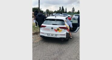 People are being loaded into a car of the Hawks