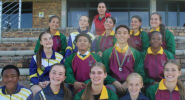 a group of athletes in tracksuits