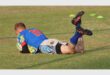 a rugby player scores a try