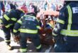 emergency workers demonstrate how to extract someone from a car wreck