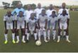 a soccer team in white kits