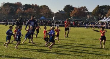 little children playing rugby