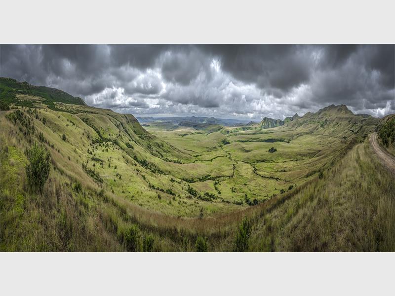 a landscape photo of flowing hills