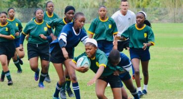 girls playing rugby
