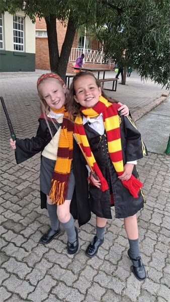 Elizabeth Dell and Annabella Ferreira dressed as Harry Potter characters.