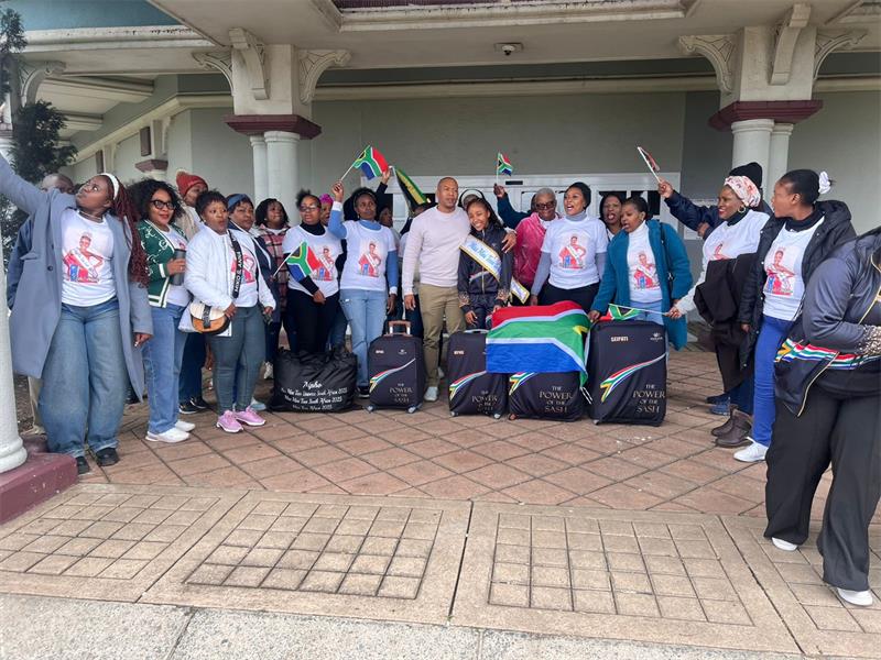 a group of people with south african flags