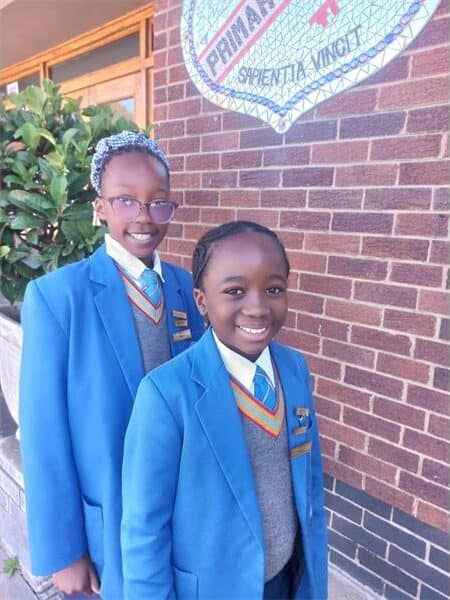 Standerton Primary School Grade Six learners Hlengiwe Chauke and Limpho Motloung received their badges. Photo: Supplied