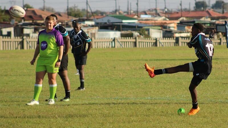 People playing rugby.
