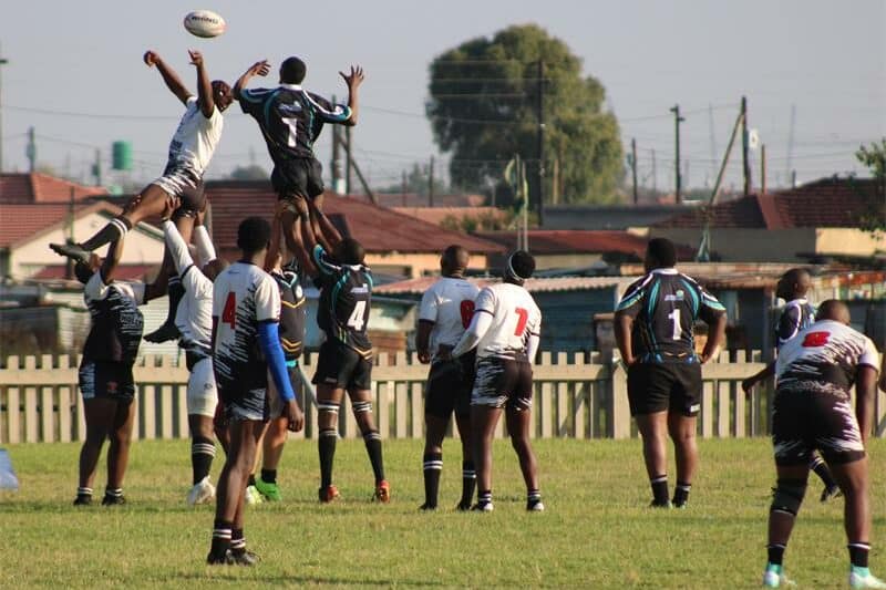 eMbalenhle Rugby Club and The Sables Standerton Rugby Club play rugby.