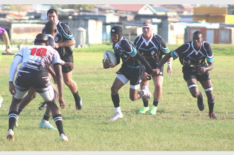 eMbalenhle Rugby Club and The Sables Standerton Rugby Club play rugby.