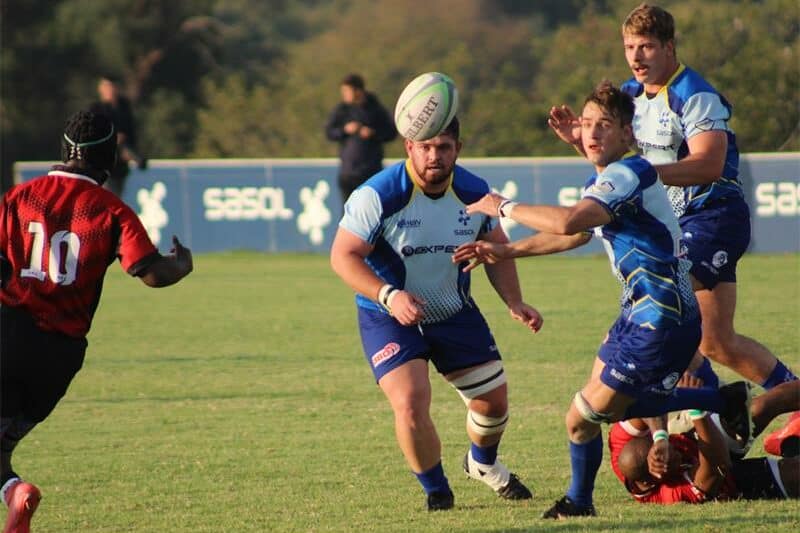 rugby players in blue
