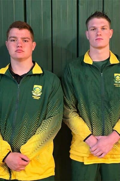 Two boys dressed in south african track suits