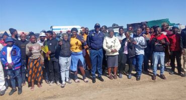 A large group of people with police officers