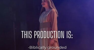 a poster of woman in Biblical clothes