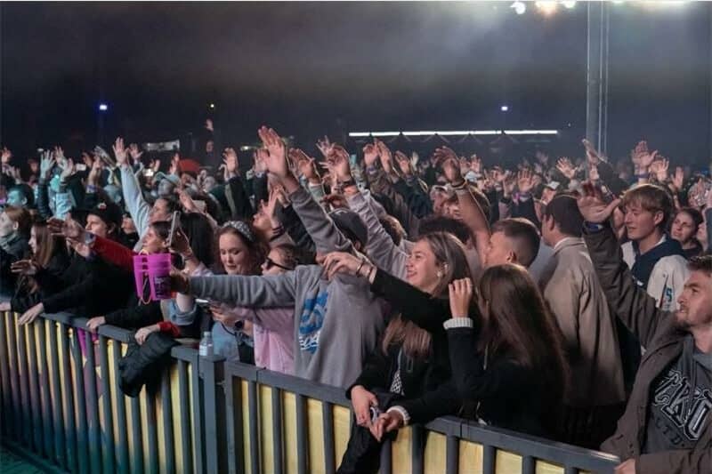 the audience in front of the music stage